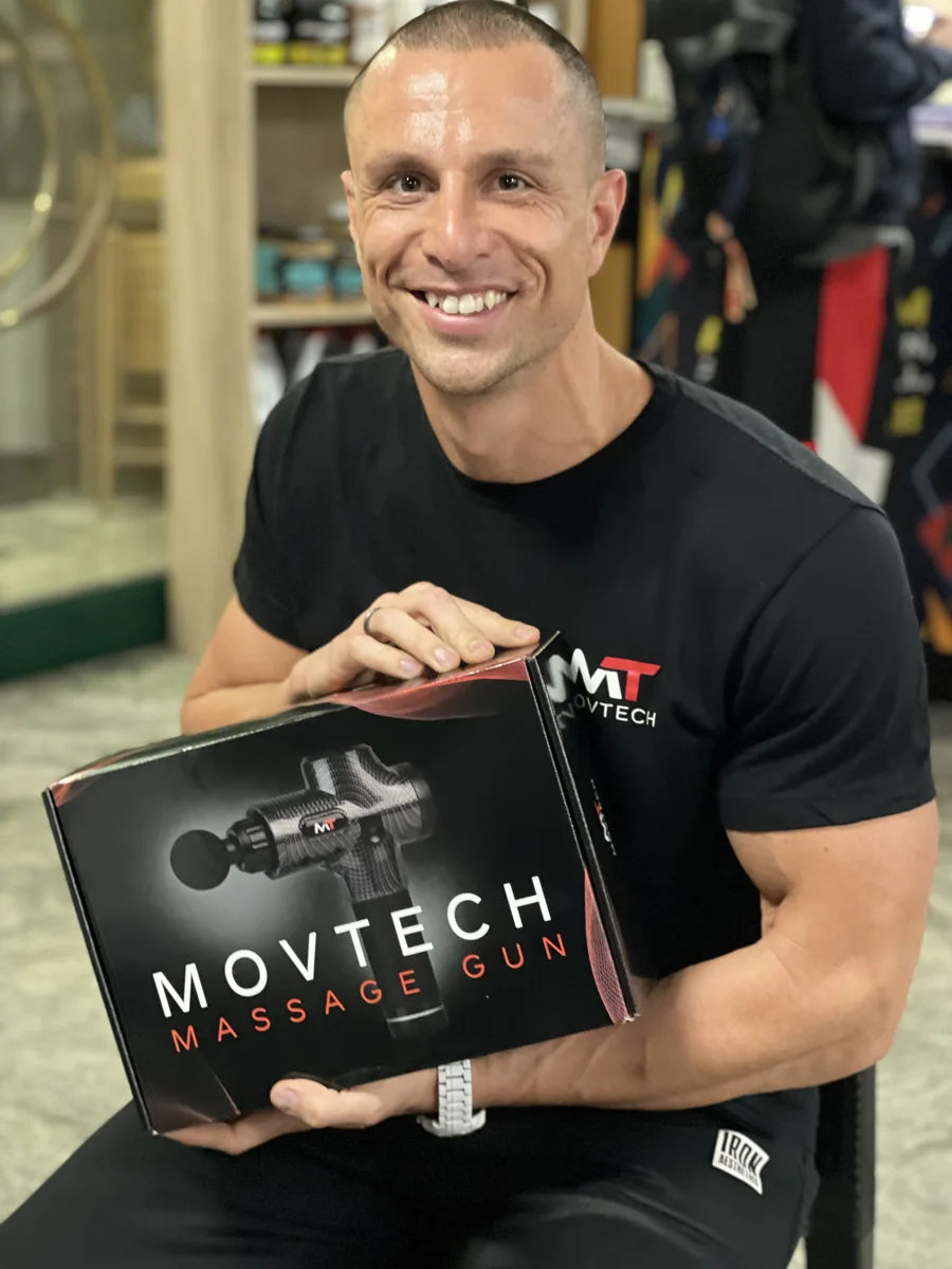 Domonkos egy Movtech masszázspisztollyal