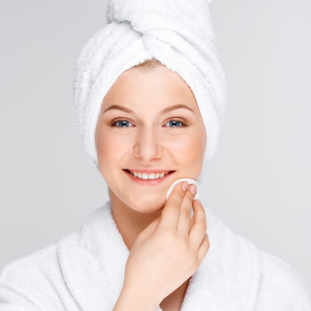 Portrait of young pretty girl over white background.